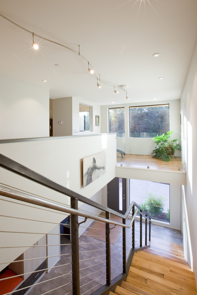 Example of a mid-sized trendy wooden floating staircase design in San Francisco