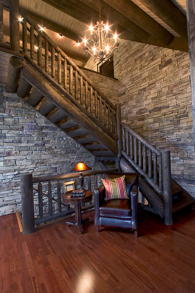 Large mountain style wooden l-shaped staircase photo in Boston with wooden risers