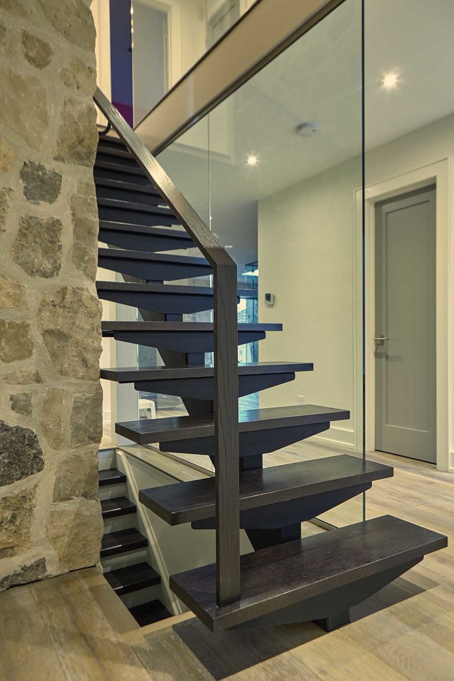 Mid-sized minimalist wooden straight open and metal railing staircase photo in Toronto