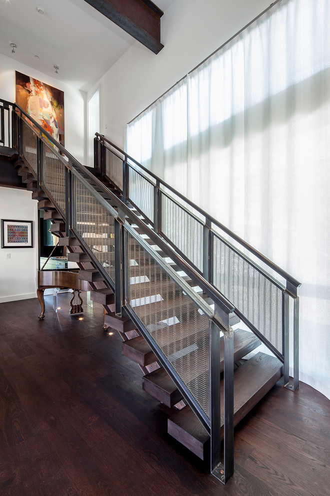 This is an example of a contemporary wood staircase in Salt Lake City with open risers.