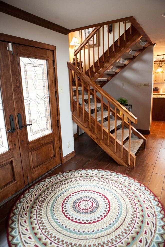 Inspiration for a mid-sized timeless l-shaped open staircase remodel in Austin