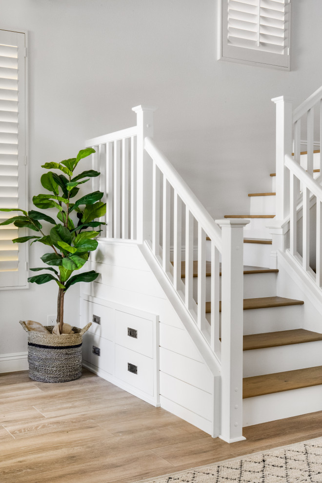 Beach style staircase photo in Orange County