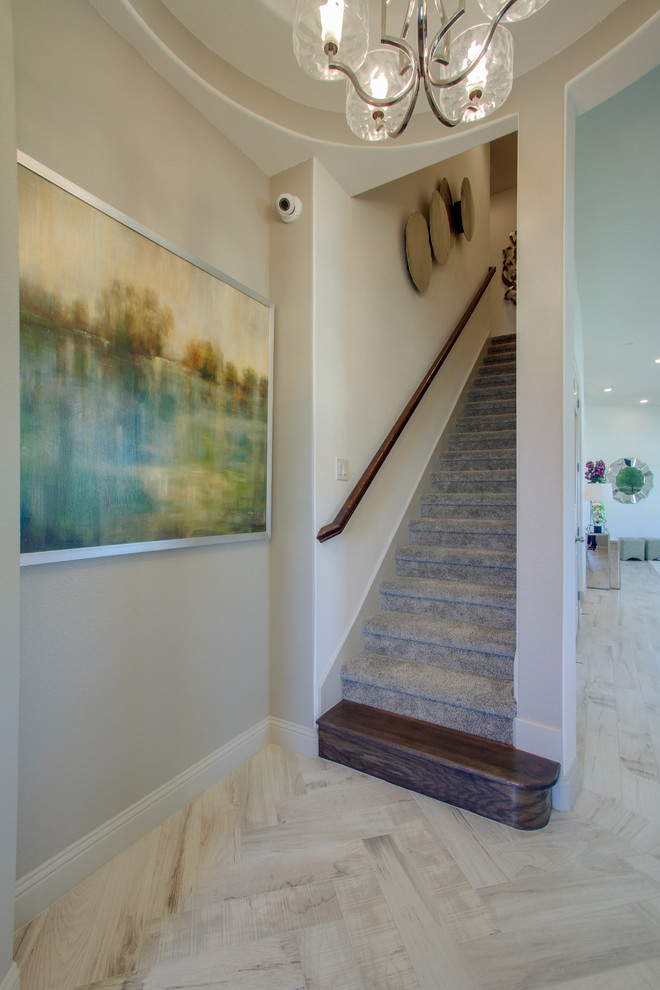 Medium sized classic carpeted straight staircase in Dallas with carpeted risers.