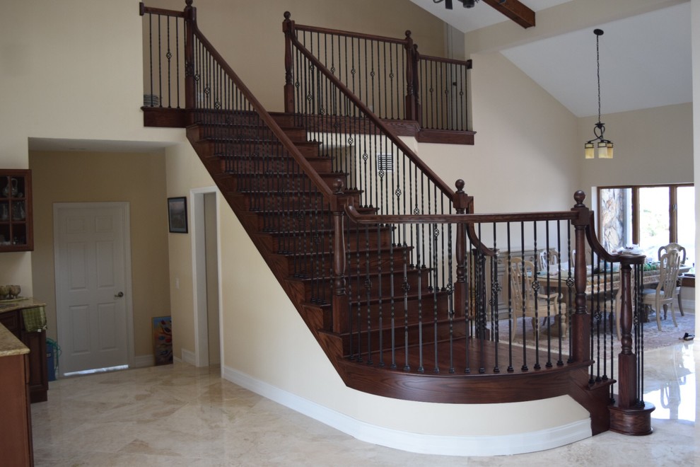 Dark Wood and Iron Balusters Modern Staircase Cleveland by