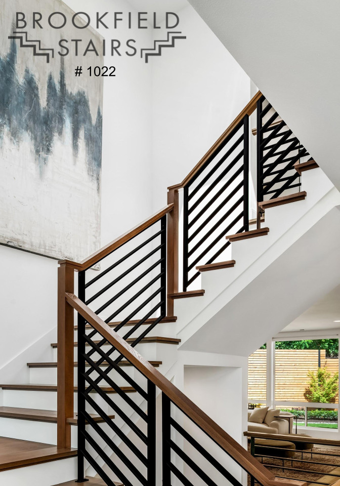 Diseño de escalera en U minimalista grande con escalones de madera, contrahuellas de madera y barandilla de varios materiales