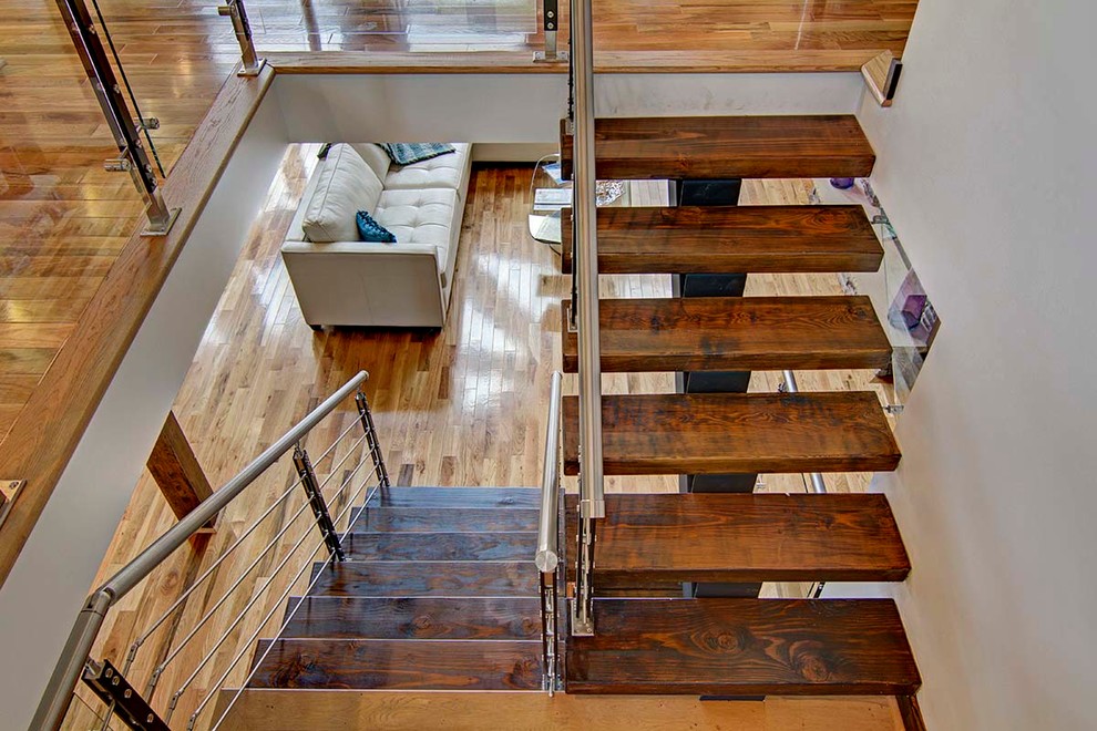 Photo of a large rustic staircase in Charlotte.