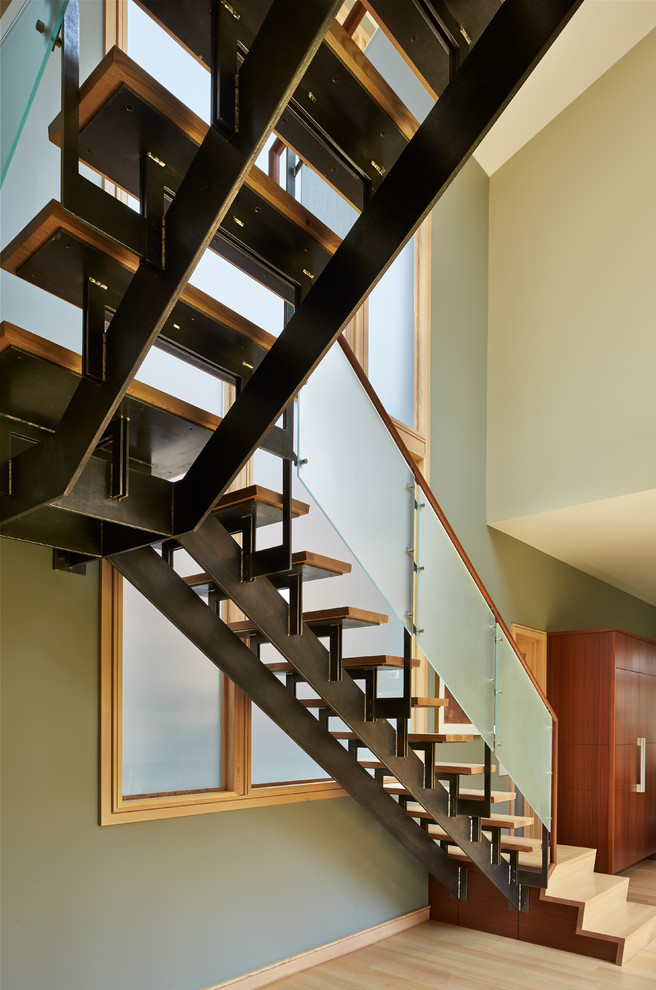 Inspiration for a mid-sized contemporary wooden l-shaped open staircase remodel in Other