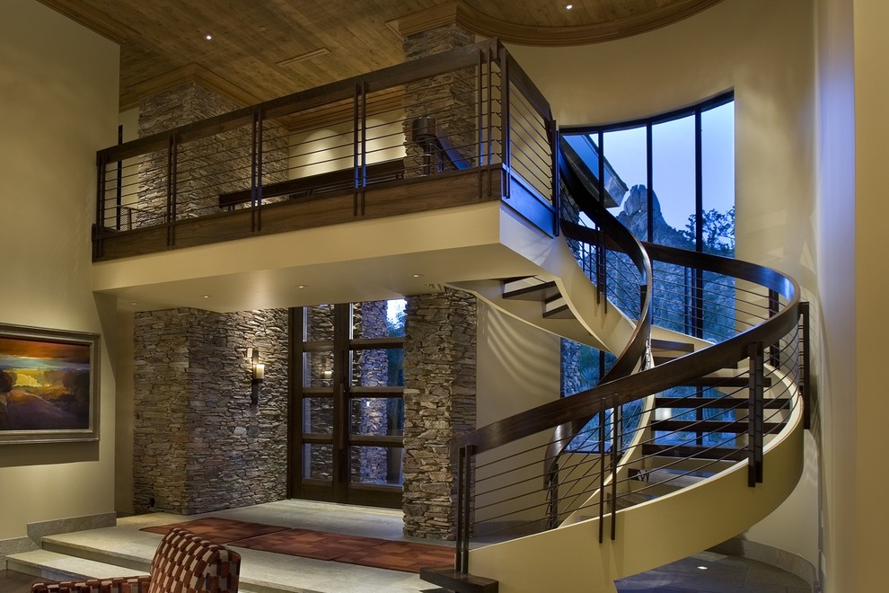 Inspiration for a contemporary curved staircase remodel in Phoenix