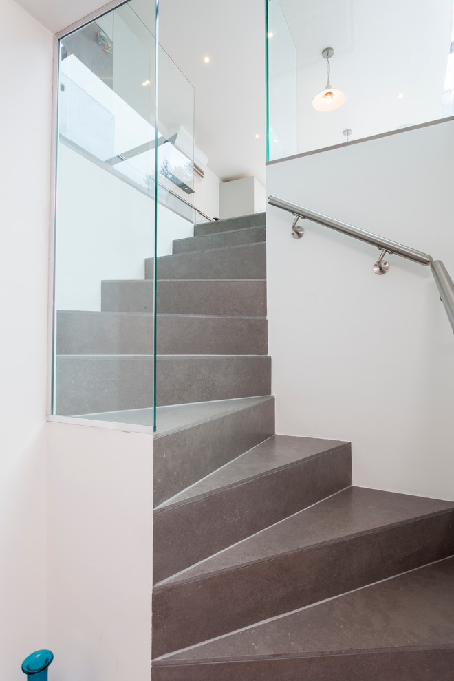 Contemporary staircase in London with feature lighting.