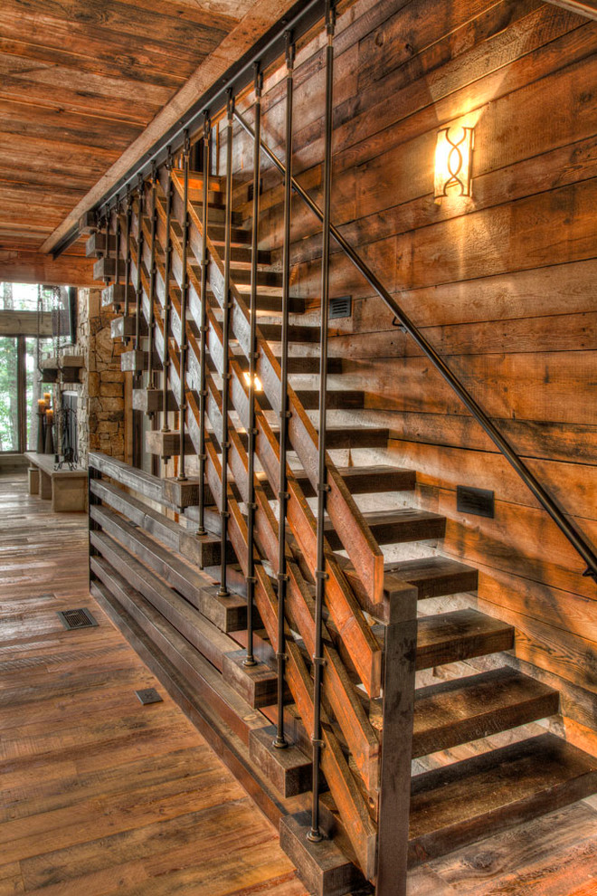 Cette photo montre un escalier sans contremarche droit montagne avec des marches en bois et un garde-corps en matériaux mixtes.