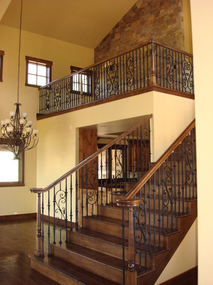 Staircase - large mediterranean wooden straight staircase idea in Denver with wooden risers