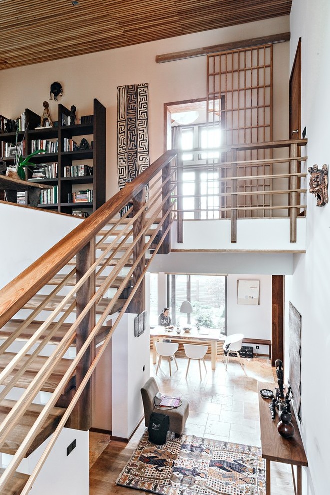 This is an example of a scandinavian wood staircase in Moscow with open risers.