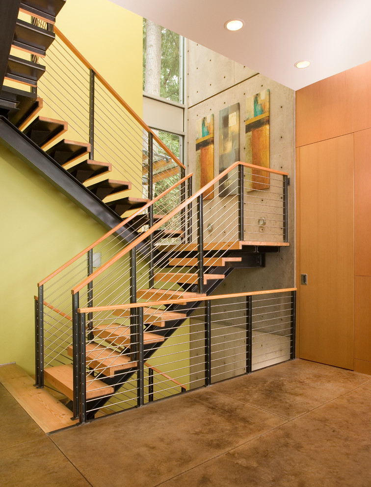 Idées déco pour un escalier contemporain avec éclairage.