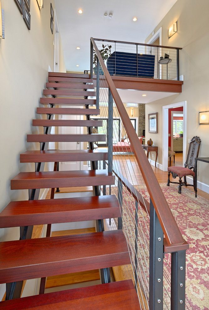Staircase - contemporary wooden straight open and cable railing staircase idea in New York
