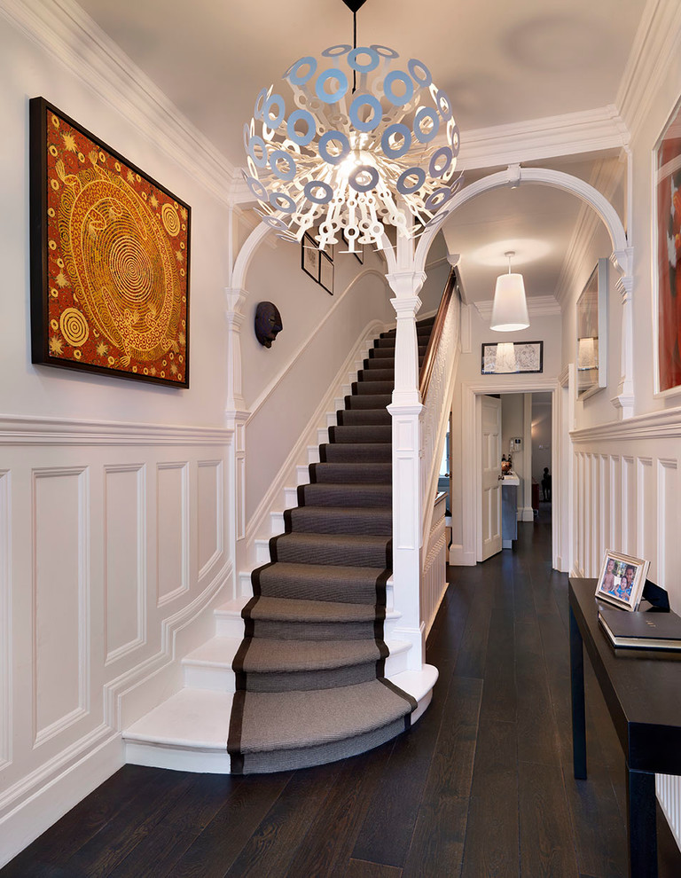 Staircase - large traditional staircase idea in London