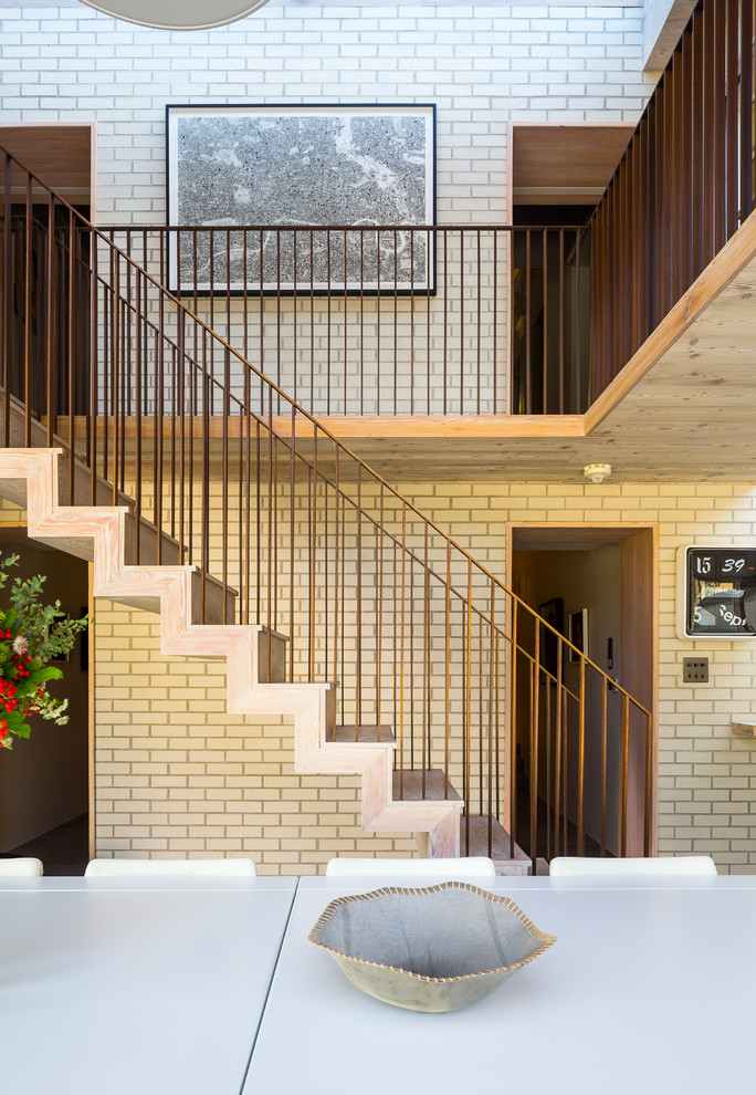 Photo of a contemporary straight staircase in London.