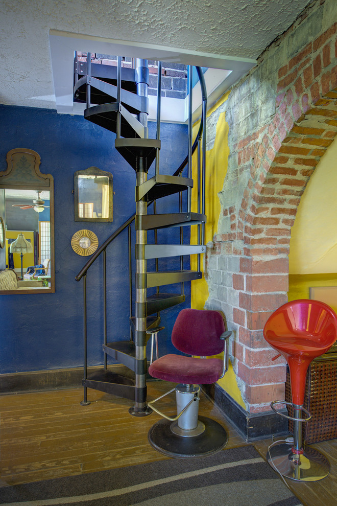 Small eclectic metal spiral staircase photo in Indianapolis with metal risers