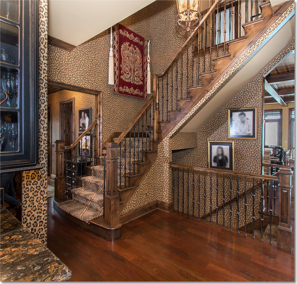 Photo of a bohemian carpeted l-shaped staircase in Cleveland with carpeted risers.