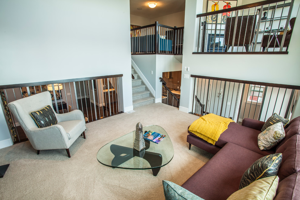 Photo of a modern carpeted straight staircase in Calgary with carpeted risers.