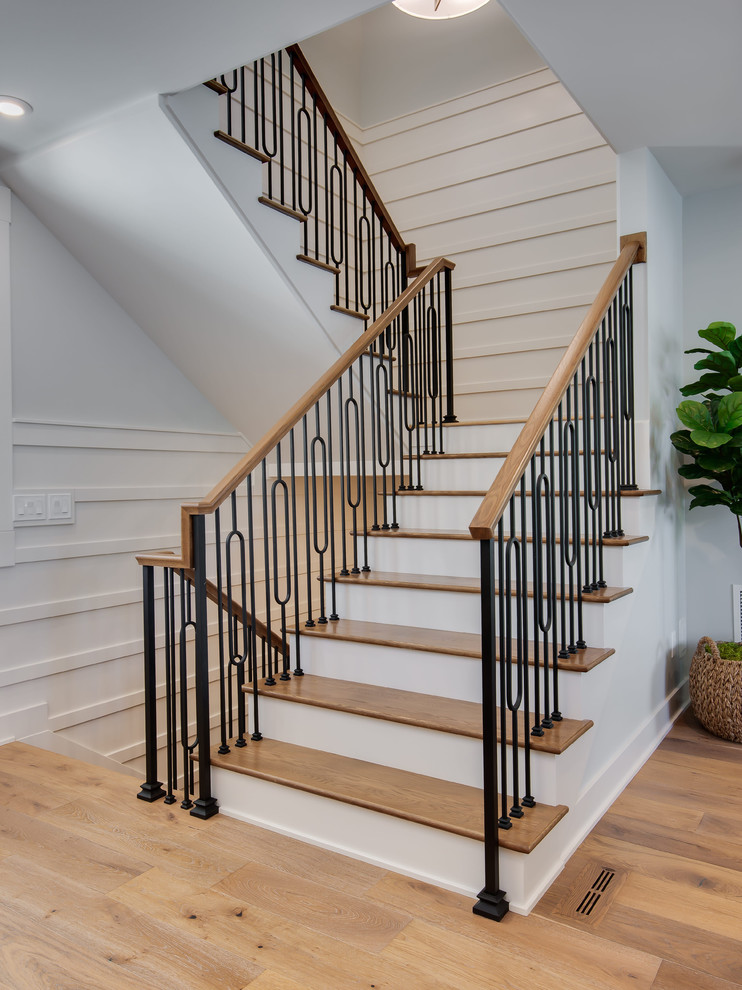 Inspiration for a farmhouse staircase remodel in Grand Rapids