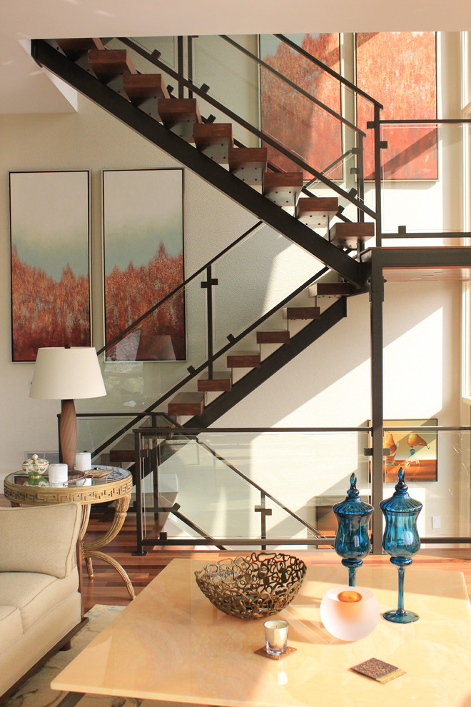 Staircase - contemporary wooden open staircase idea in Cleveland