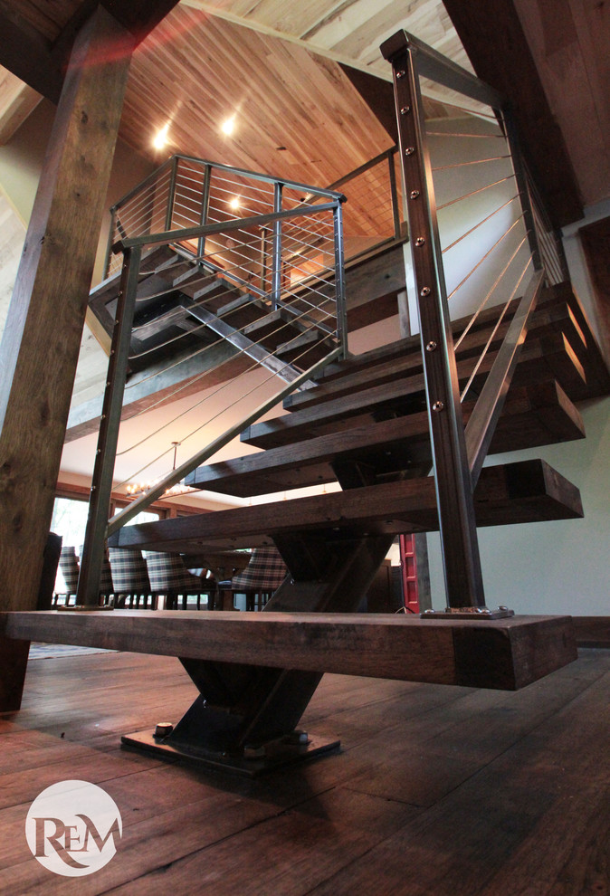 Стильный дизайн: большая угловая лестница в стиле рустика с деревянными ступенями без подступенок - последний тренд