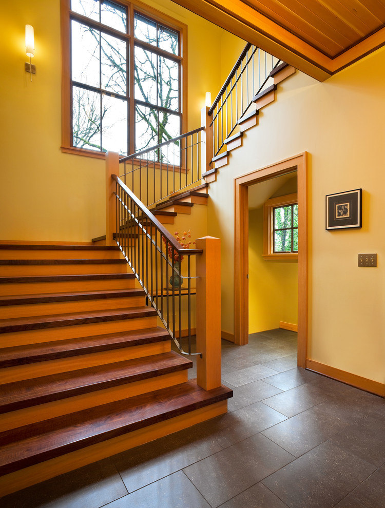 Example of a trendy wooden staircase design in Portland