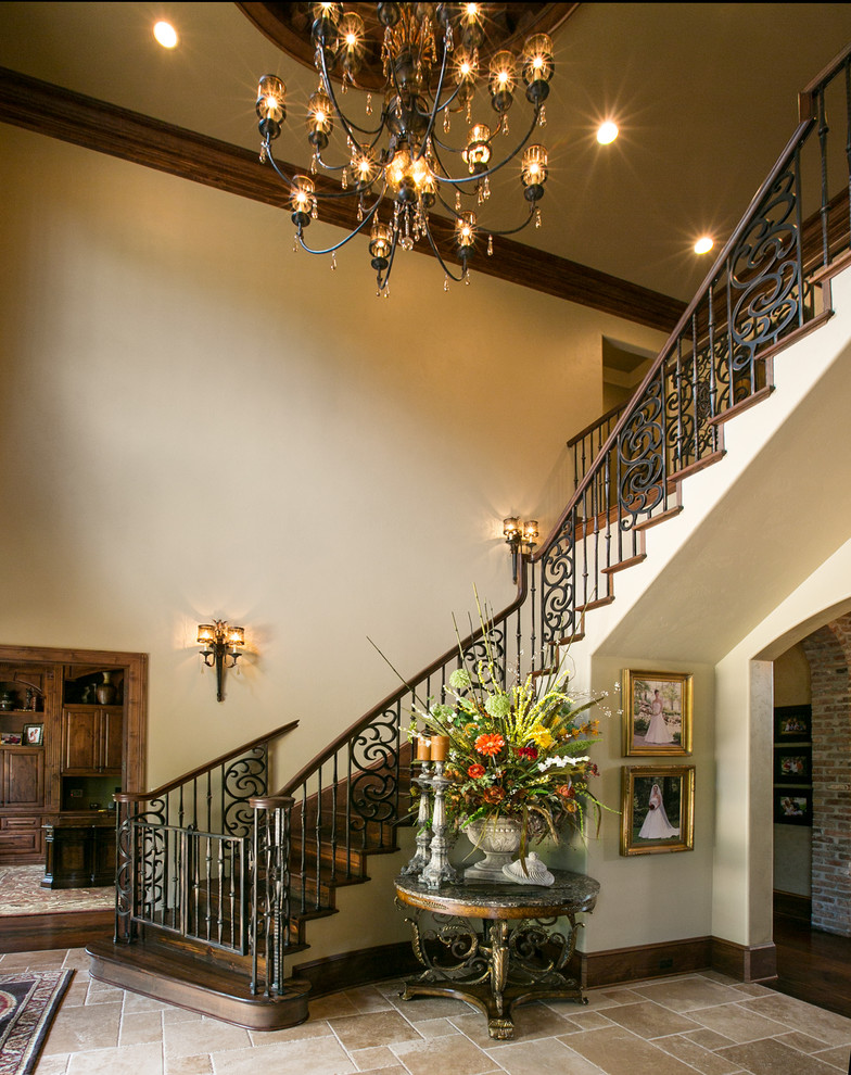 entry-hall-grand-staircase-terry-m-elston-builder-img~48515fec0027585d_9-6028-1-3be05ae.jpg