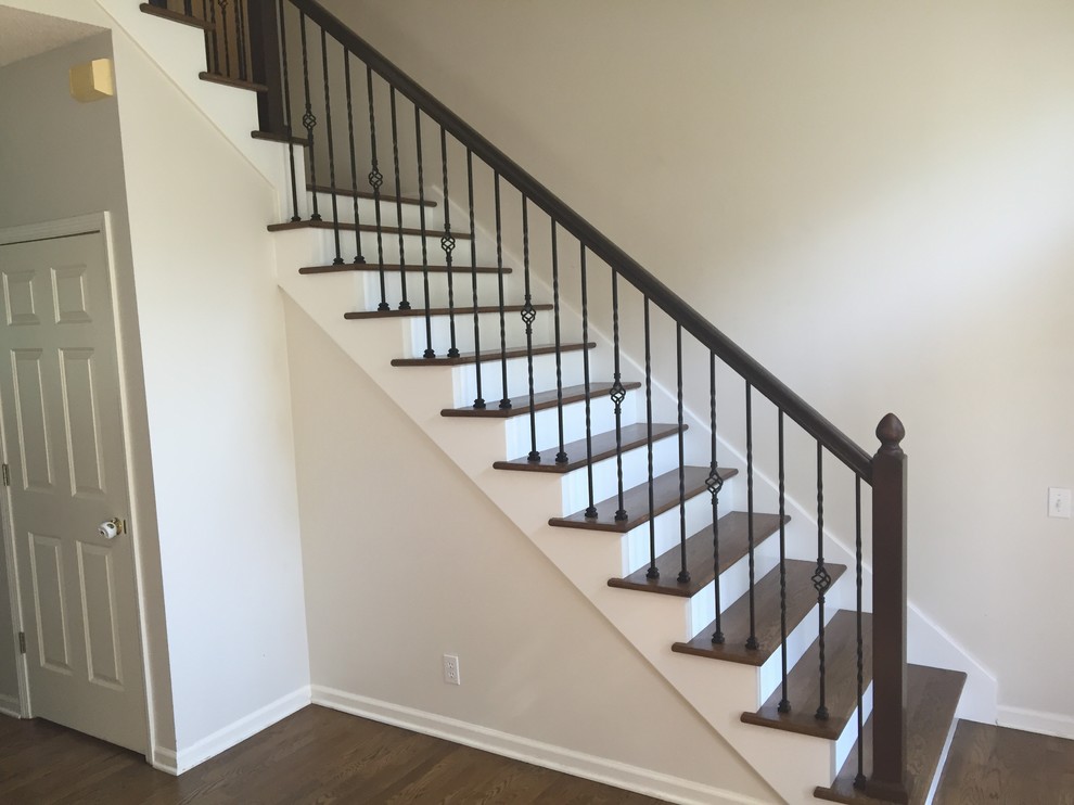 Staircase - mid-sized traditional wooden l-shaped mixed material railing staircase idea in Kansas City with painted risers
