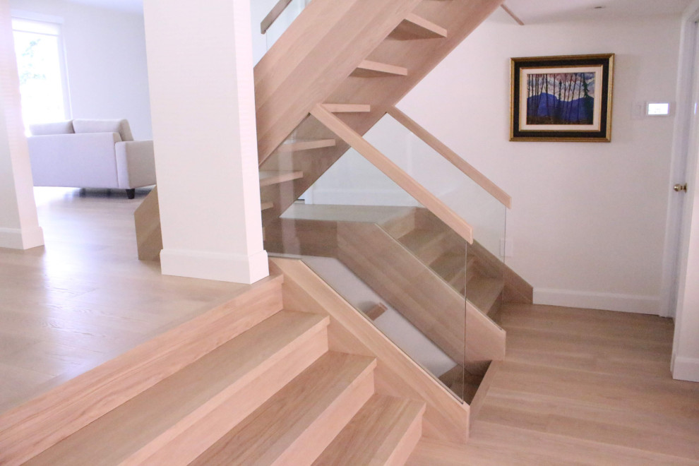 Escalier ajouré avec limons de bois Modern Staircase Montreal by BOIS FRANC RIVE SUD INC
