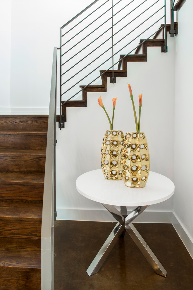 Example of a trendy wooden staircase design in Austin with wooden risers