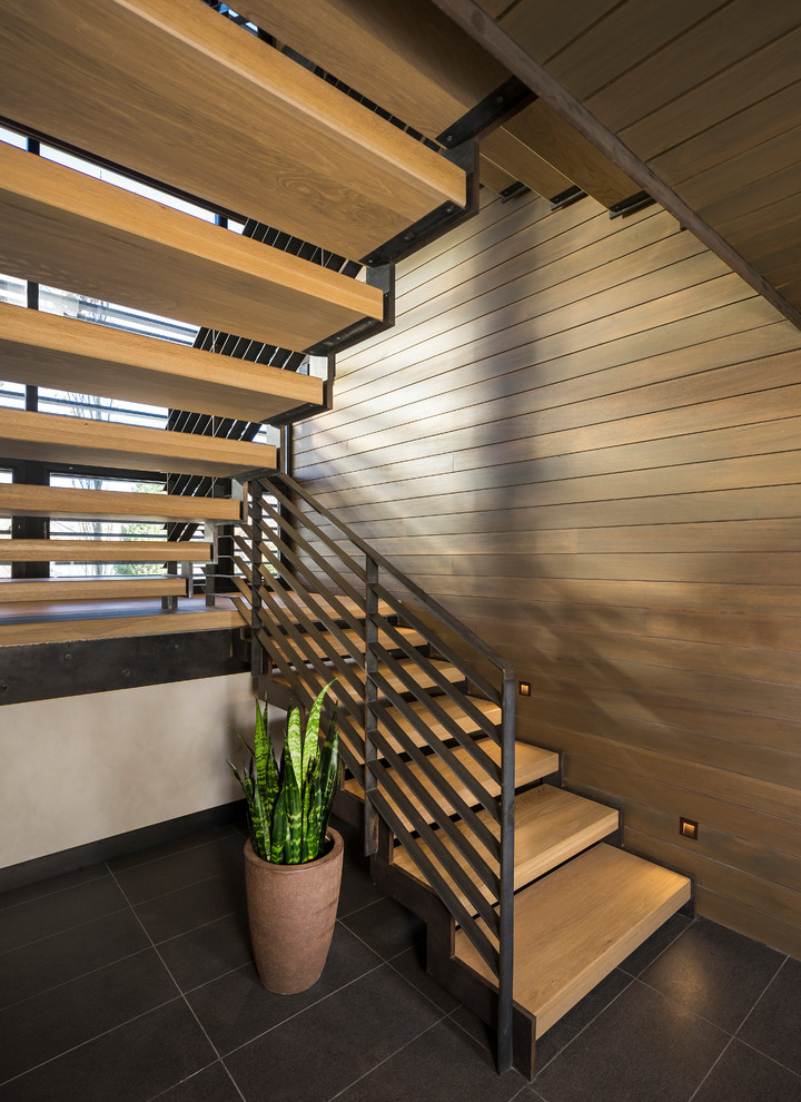 Example of a huge trendy staircase design in Salt Lake City