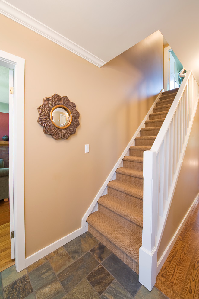 Mid-sized trendy carpeted straight staircase photo in Vancouver with carpeted risers