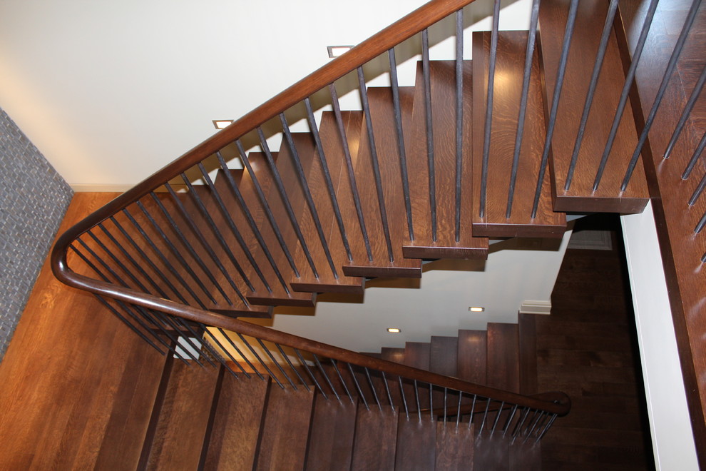 Inspiration for a contemporary wooden floating open staircase remodel in Columbus