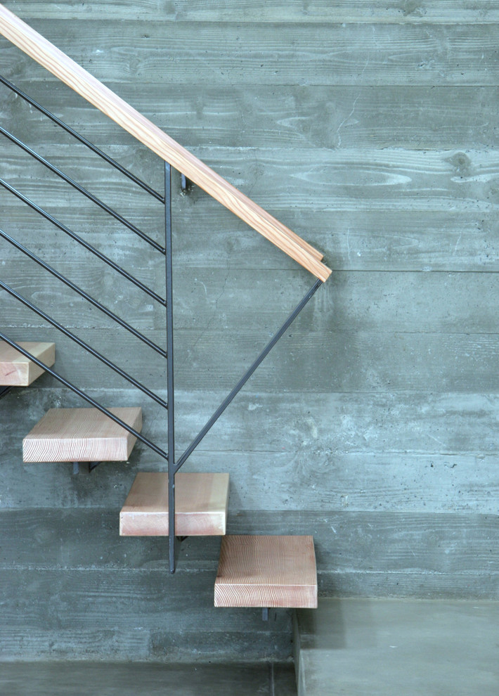 Minimalist wooden floating staircase photo in San Francisco
