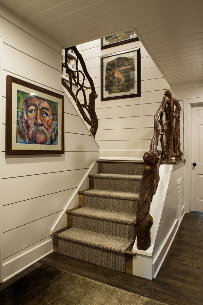 Inspiration for a mid-sized rustic wooden l-shaped staircase remodel in Atlanta with wooden risers