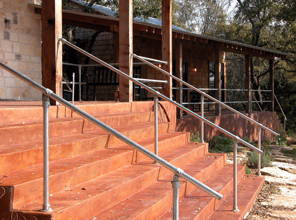 Staircase - industrial staircase idea in Austin