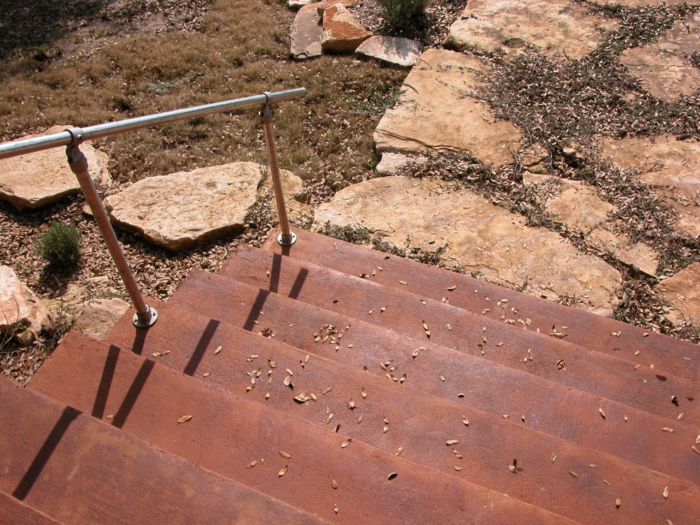 Example of a trendy staircase design in Austin
