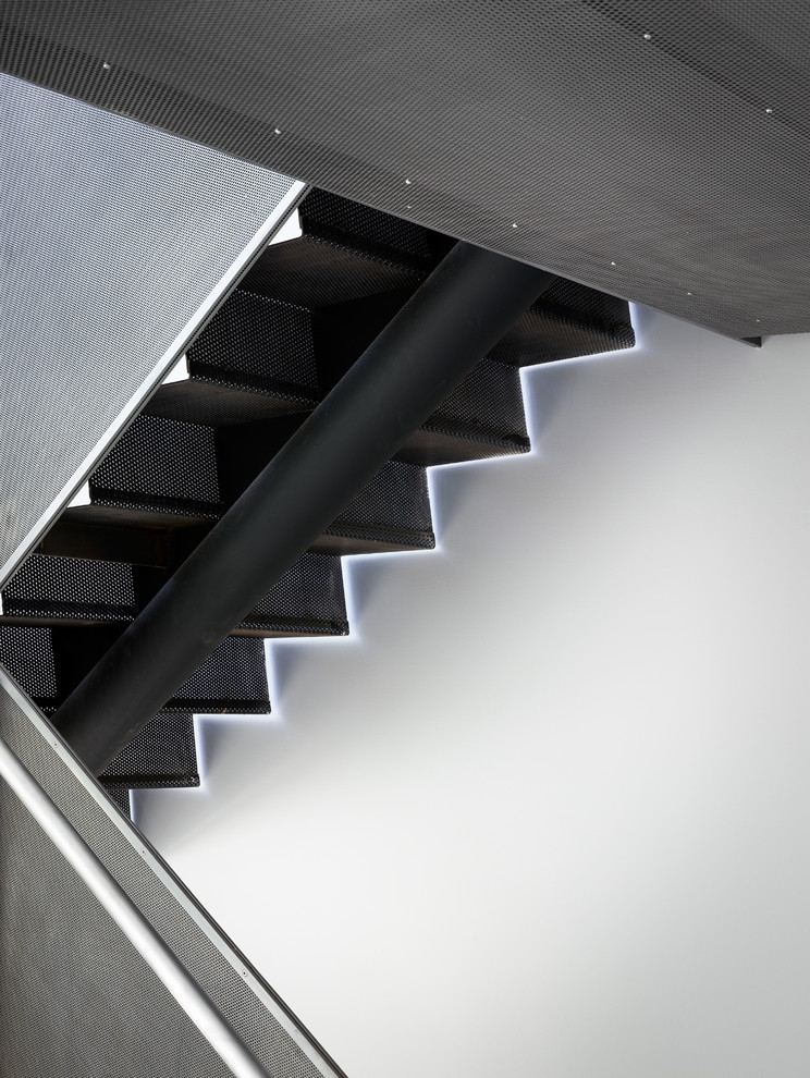 Modern metal metal railing staircase in San Francisco with metal risers.