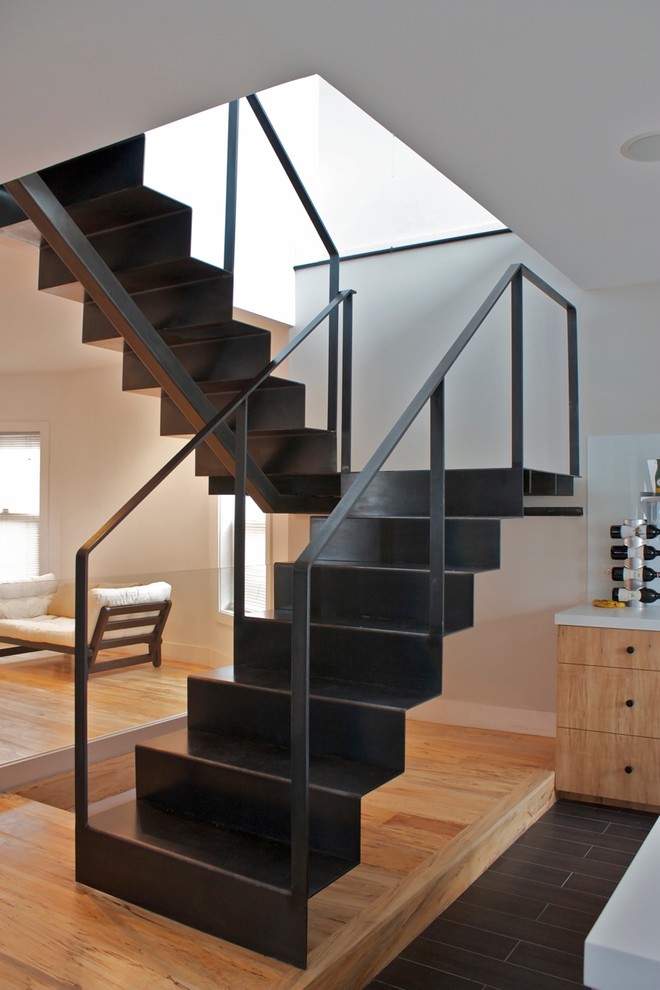 Staircase - mid-sized modern metal staircase idea in Chicago with metal risers