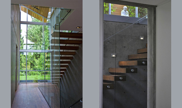 Inspiration for a mid-sized contemporary wooden straight open and glass railing staircase remodel in Seattle