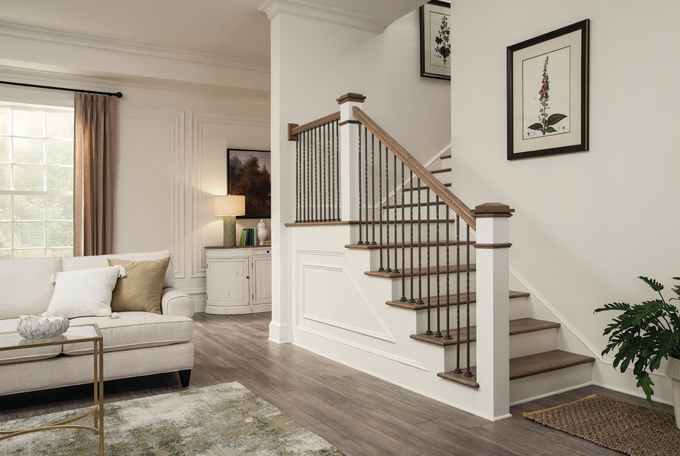Inspiration for a traditional staircase in Charlotte with feature lighting.