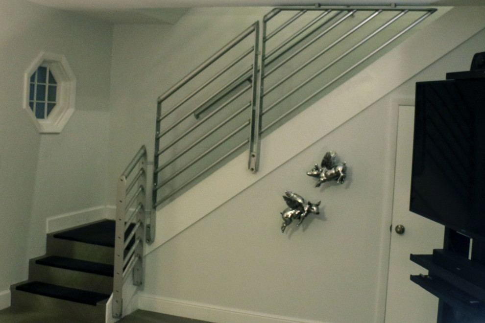 Example of a small minimalist metal straight staircase design in Miami with metal risers