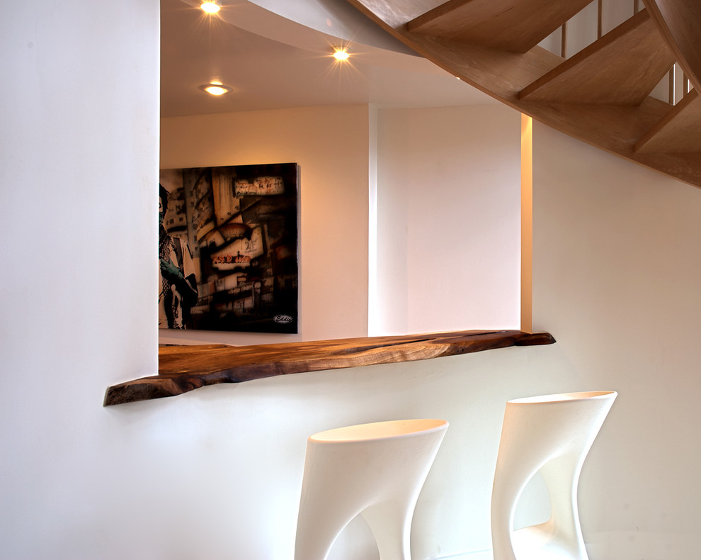 Inspiration for a contemporary spiral staircase in San Francisco with open risers.