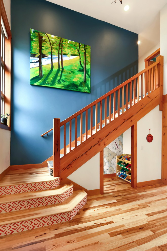 Inspiration for a craftsman wooden straight wood railing staircase remodel in Seattle with wooden risers