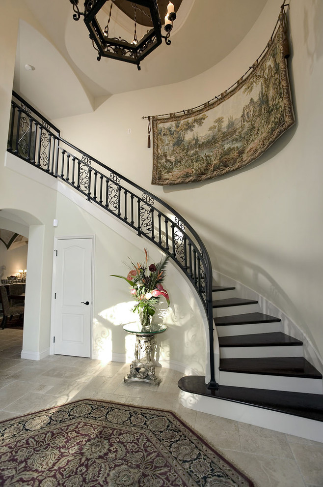Example of a tuscan staircase design in Los Angeles
