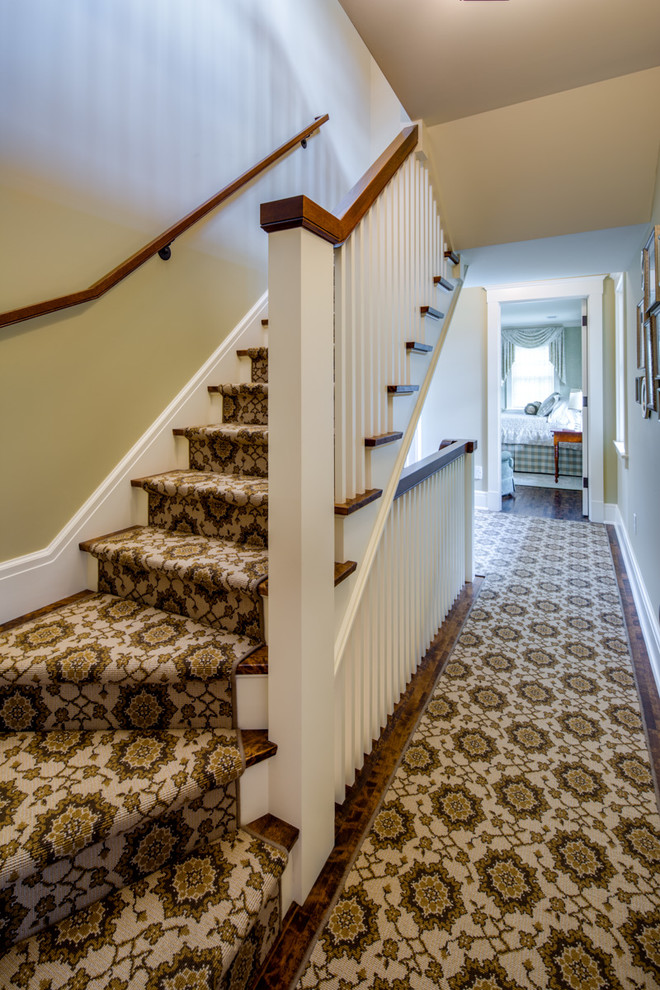 Staircase - small traditional wooden straight staircase idea in Minneapolis with painted risers