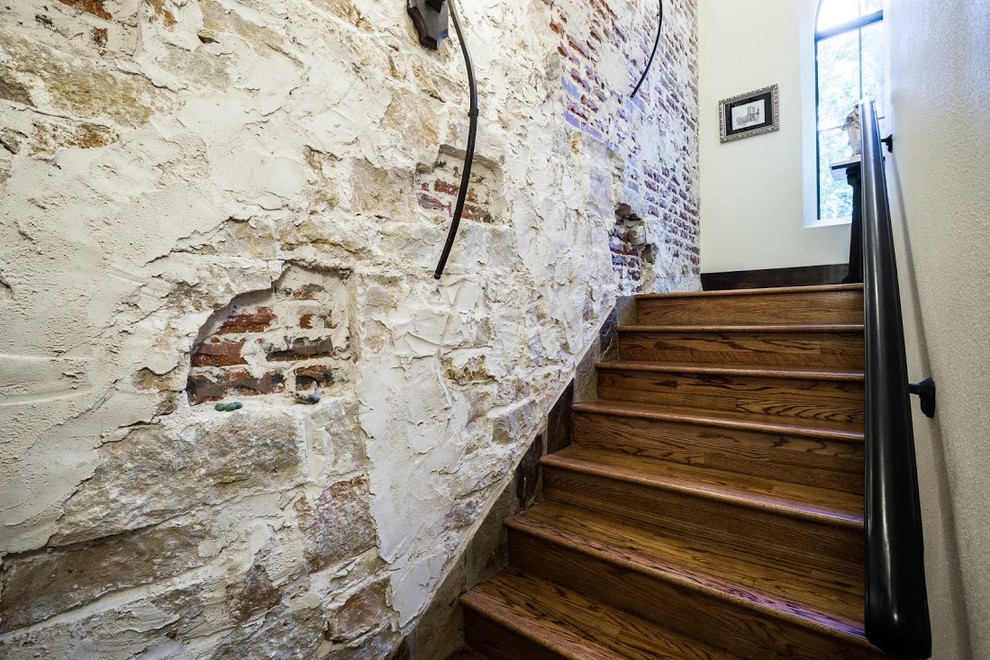 Inspiration for a small urban wood straight staircase in Dallas with wood risers.