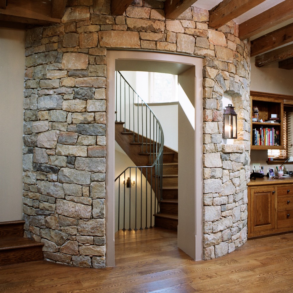This is an example of a rustic curved staircase in Philadelphia.