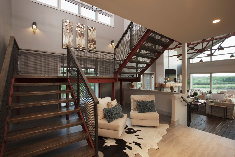 Example of a large trendy metal u-shaped open staircase design in Calgary